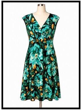 100% SILK. Valerie Stevens, floral print V-neck fit and flare.